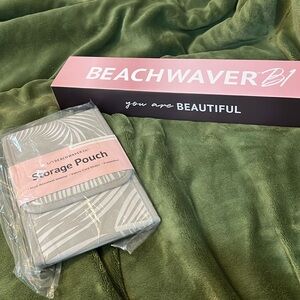 Brand new Beachwaver B1 rotating curling iron w bonus storage pouch - $22 value
